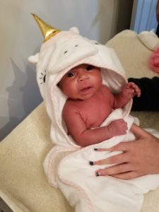 Baby in a unicorn towel