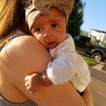Woman holding cute baby