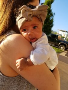 Woman holding cute baby
