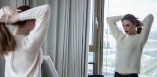 If Your Mirror Could Talk, Here’s What It Would Say girl looking in mirror