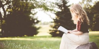 female reading book poets feminist