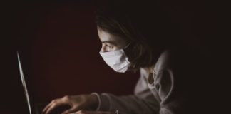 What To Do If Your Coworker Tests Positive For COVID