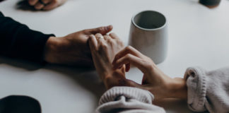How To Respond When Your Partner Asks About Your Sexual History couple-discuss-sexual-past