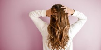Scalp Exfoliation: 5 Reasons You Should Hop On This Beauty Trend woman-hair-scalp