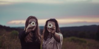 5 Tips For Maintaining Your Long-Term Friendships friends-holding-flowers