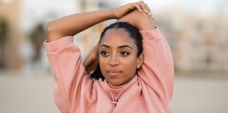 11 Gentle Stretches To Wake Your Body Up Every Morning woman-doing-stretches