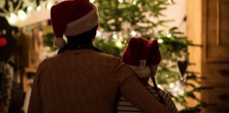 10 Songs To Add To Your Holiday Playlist listening-to-holiday-playlist