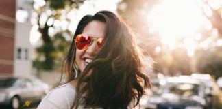 5 Steps To Starting A New Chapter In Your Life woman smiling sunglasses