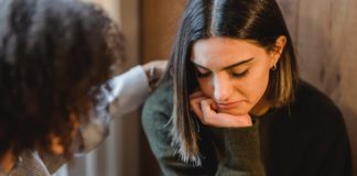 female friends looking sad