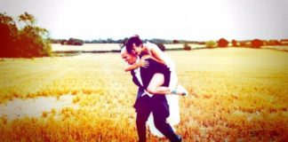married couple in field