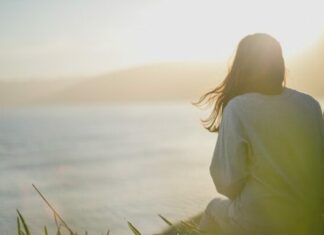 3 Steps To Finding Your Motivation Again woman gazing into distance