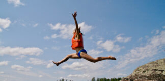 How to Stay Safe When Cliff Jumping woman-cliff-jumping