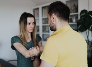 woman lies abusive man