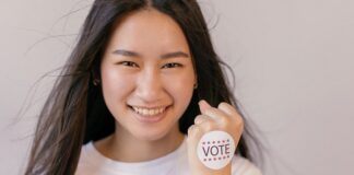 Instead of Judging Someone for Not Voting, Educate Them woman-voting