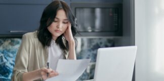 5 Things You Can Do To Manage Debt If You Get Laid Off Woman Stressed About Debt After Laid Off