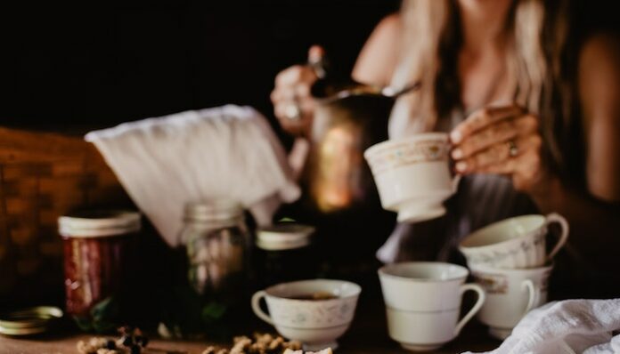Woman Making Tea With Herbs Natural Energy