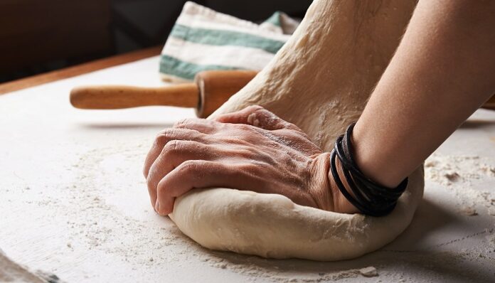 nadya-spetnitskaya-tOYiQxF9-Ys-unsplash kneading-bread