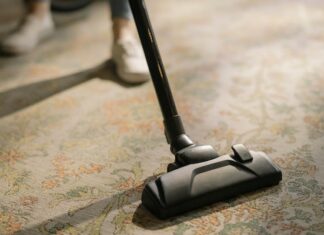Woman Using Cordless Vacuum