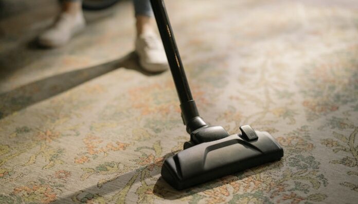 pexels-cottonbro-studio-4107284 Woman Using Cordless Vacuum