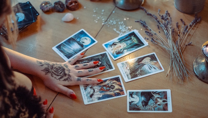 Woman Reading Oracle Cards