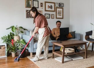 Woman Using Cordless Vacuum