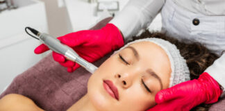 Microneedling 101: How It Works & How It Benefits Your Skin Woman Having Microneedling Procedure