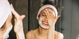 Woman Applying Skincare Products