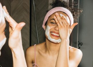 Woman Applying Skincare Products