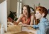 Creative Ways to Showcase Your Child’s Journey Through Teenage Years Mom and Son Making Digital Journal of Teen Years