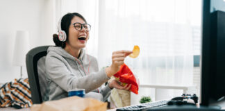 3 Things That Make Anime So Addictive Girl Laughing at Anime