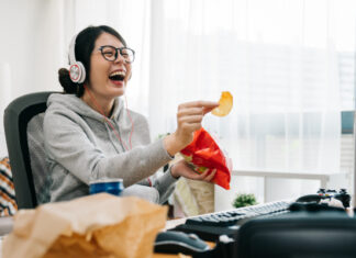 Girl Laughing at Anime