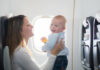 Woman Traveling With Baby and Essentials