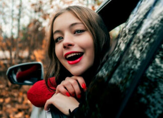 How to Eliminate Odors Inside Your Car Woman Trying to Eliminate Car Odors