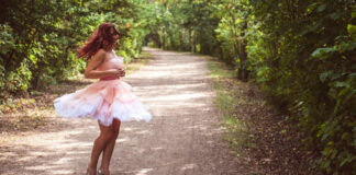 Woman Having Fun in the Woods