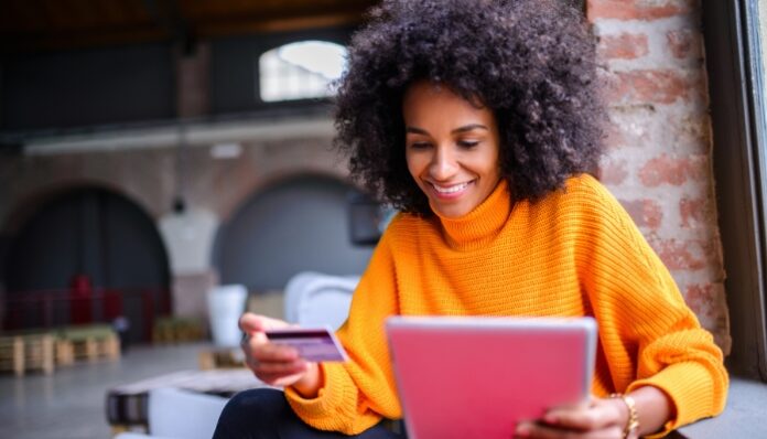 Woman Making Online Purchase After Chat GPT Saves Money