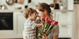 Flowers for Mother’s Day: A Timeless Expression of Love Woman Receiving Mother's Day Flowers from Son