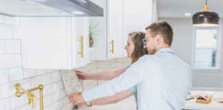 What’s In & Out For Kitchens In 2025 Couple Choosing Tile and Countertops