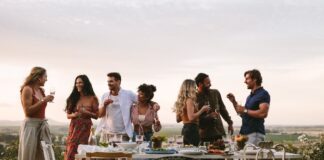 Group of Friends Having Outdoor Party With Smoked Meats