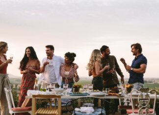 Group of Friends Having Outdoor Party With Smoked Meats