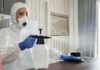 Person Spraying After Mouse Infestation