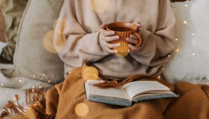 Woman Staying Warm with Geothermal Heating