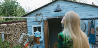 Women Using Tool Storage Shed for Backyard Gardening