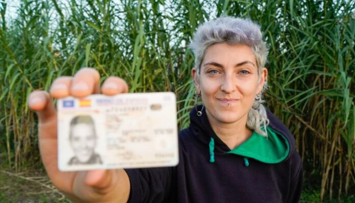 ID Scanning Woman holding drivers license