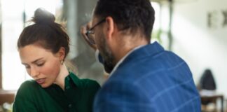 Woman And Man Discussing Sexual Abuse