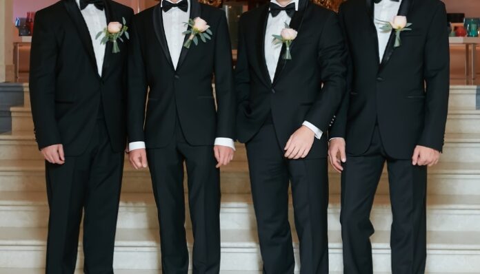 London Wedding Suits Groom and Groomsmen Waiting for Wedding in London Wedding Suits