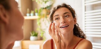 Woman Applying Products During Daily Skincare Routine
