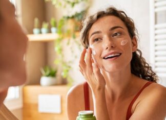 Woman Applying Products During Daily Skincare Routine