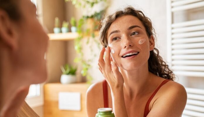 Saffron Serum Woman Applying Products During Daily Skincare Routine