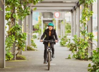 Woman Riding Bike to Help Environment