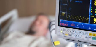 How A Lawyer Can Help After An Emergency Room Mistake Causes Harm Man in Emergency Room Bed